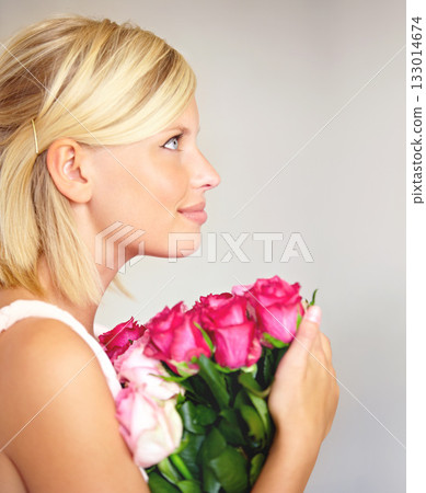 Woman, rose and bouquet in studio for valentines day, gift or thank you gesture on white background. Fresh, roses and girl with flowers, happy and relax with floral arrangement and mock up space Woman, rose and bouquet in studio for valentines day, gift or thank you gesture on white background. Fresh, roses and girl with flowers, happy and relax with floral arrangement and mock up space 133014674