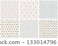 Hand-drawn seamless patterns with brush-painted waves, zigzags, polka dots 133014796