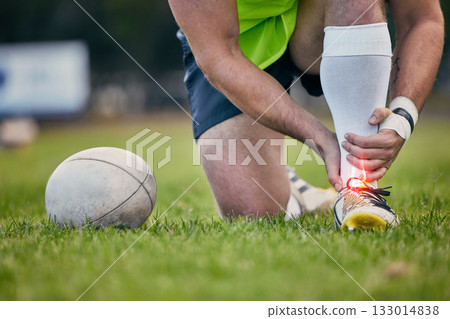 Rugby, pain and man with foot injury on sports field for practice match, training and game on grass. Medical emergency, accident and male athlete with joint inflammation, ankle sprain and tendinitis 133014838
