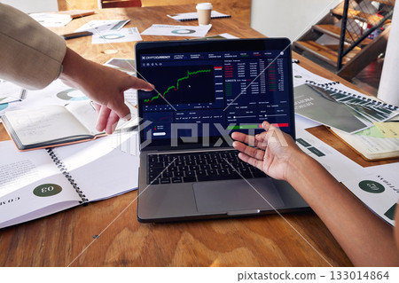Laptop screen, stock market and hands of people in meeting, data analytics and statistics analysis or review growth. Computer, software and trading, investment and online profit with analyst teamwork Laptop screen, stock market and hands of people in meeting, data analytics and statistics analysis or review growth. Computer, software and trading, investment and online profit with analyst teamwork 133014864