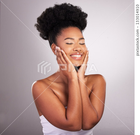 Skincare, African beauty and black woman with hands on face, confidence in white background and cosmetics product. Health, dermatology and natural makeup, model in studio for healthy skin and care. Skincare, African beauty and black woman with hands on face, confidence in white background and cosmetics product. Health, dermatology and natural makeup, model in studio for healthy skin and care. 133014910