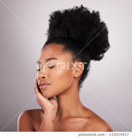 Skincare, beauty and black woman with eyes closed in confidence, white background and cosmetics product. Health, dermatology and natural makeup, African model in studio for healthy skin and wellness. Skincare, beauty and black woman with eyes closed in confidence, white background and cosmetics product. Health, dermatology and natural makeup, African model in studio for healthy skin and wellness. 133014917