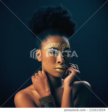 Gold, glitter and style with black woman and makeup in studio for luxury, cosmetics and African pride. Natural, creative and goddess with female model on background for queen, bronze and glamour 133015034
