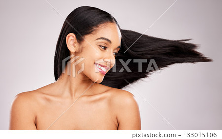 Beauty, hairstyle and wind with woman in studio for shampoo, confidence and keratin treatment. Textures, salon and shine with female model on white background for glow, self care and cosmetics Beauty, hairstyle and wind with woman in studio for shampoo, confidence and keratin treatment. Textures, salon and shine with female model on white background for glow, self care and cosmetics 133015106