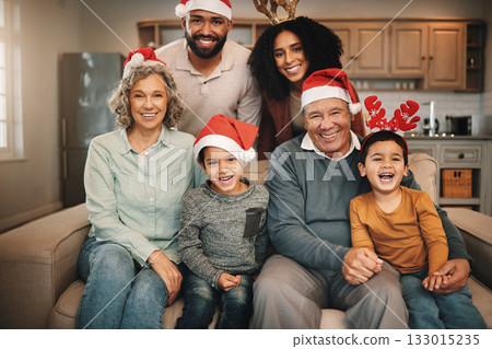 Christmas, big family and portrait smile on sofa in living room in home, bonding and care. Xmas, laughing and happy grandmother, grandfather and parents with boys or children enjoying holiday time. Christmas, big family and portrait smile on sofa in living room in home, bonding and care. Xmas, laughing and happy grandmother, grandfather and parents with boys or children enjoying holiday time. 133015235