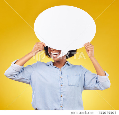 Social media, studio smile and black woman with speech bubble for opinion, marketing space or brand advertising. Product placement, mock up billboard and person with voice mockup on yellow background 133015301