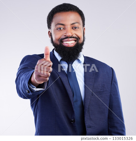 Thumbs up, business portrait and happy black man in studio for yes review, thank you and trust. Corporate male, model and thumb gesture for support, like emoji and motivation of agreement, ok or vote 133015326