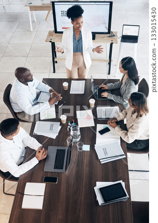 Business meeting, presentation and people above for conference, seminar or workshop in corporate training. Professional black woman, manager or speaker speaking to clients, employees or company staff 133015430