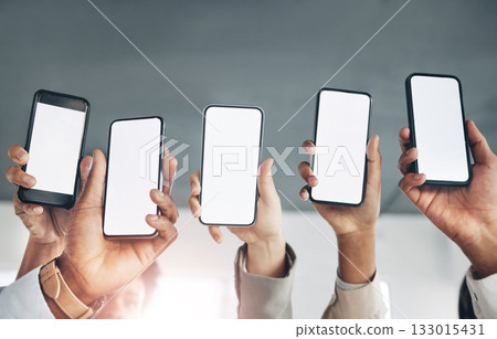 Business people, hands or mobile screen on mockup space networking, advertising or digital marketing. Team of employees with online product placement on phone application display or internet website Business people, hands or mobile screen on mockup space networking, advertising or digital marketing. Team of employees with online product placement on phone application display or internet website 133015431