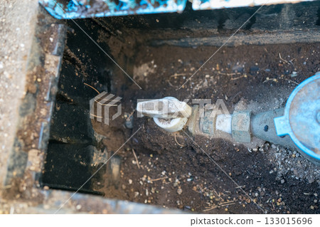 Dirt accumulates inside the water meter box Dirt accumulates inside the water meter box 133015696