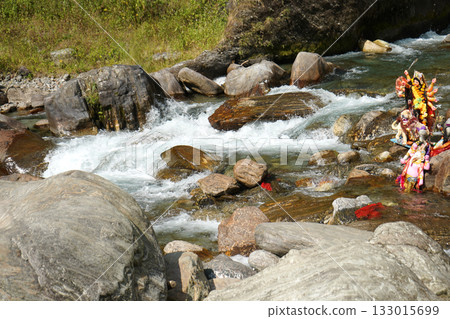 Immersing Religious Idols in a Natural Mountain Stream at Kalimpong Immersing Religious Idols in a Natural Mountain Stream at Kalimpong 133015699