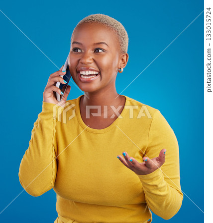 Phone call, excited and black woman talking in studio for social network, connection and conversation. Communication mockup, smartphone and surprised girl speaking, smile and chat on blue background 133015724