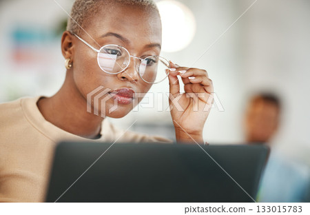 Office, computer and black woman with glasses, serious or reading email, online research or report. Laptop, concentration and African journalist proofreading article for digital news website or blog Office, computer and black woman with glasses, serious or reading email, online research or report. Laptop, concentration and African journalist proofreading article for digital news website or blog 133015783