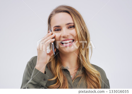 Smile, phone call and portrait of woman talking in studio isolated on a white background. Happy, cellphone and face of female person speaking, discussion or communication, conversation and networking 133016035
