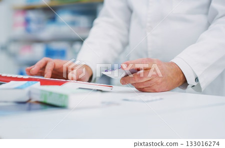 Pharmacy pills, computer keyboard and person hands typing, research and search product info on drugs store database. Dispensary service, hospital medicine and chemist enter supplement information 133016274