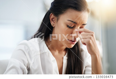 Business, burnout or woman with headache, stress or tired in office with fatigue, anxiety or depression. Depressed employee, sad female consultant or person frustrated with migraine pain in workplace Business, burnout or woman with headache, stress or tired in office with fatigue, anxiety or depression. Depressed employee, sad female consultant or person frustrated with migraine pain in workplace 133016473