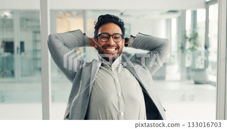 Happy, businessman or stretching with completion for done tasks, finished or break in office. Excited, man or employee with smile, rest or relax for productive day, deadline or free time in workplace 133016703