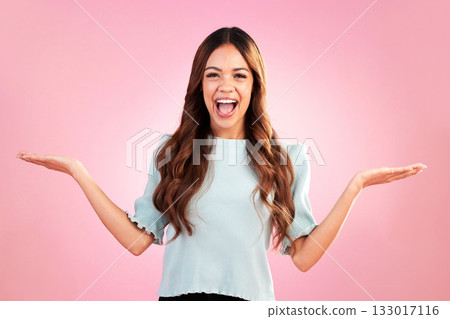 Happy woman, marketing and smile in portrait with hands out, branding and product placement with promo on pink background. Advertising, logo and brand, mockup space and female with display in studio 133017116