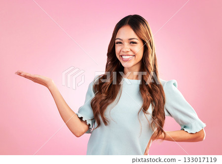 Happy, product placement and portrait of a woman with a gesture isolated on a pink background. Smile, mockup and girl showing a logo, branding and marketing with space for promotion in studio 133017119
