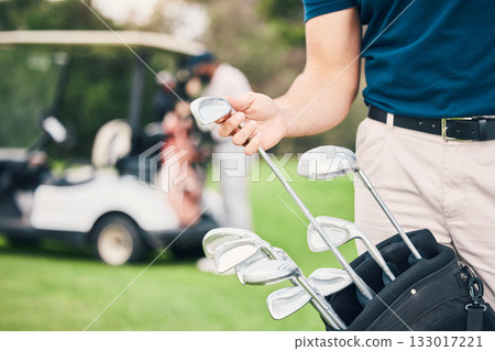 Golf, choose club and hands of man with bag on course ready to start game, practice and training for competition. Professional golfer, golfing and male caddy for exercise, fitness and recreation Golf, choose club and hands of man with bag on course ready to start game, practice and training for competition. Professional golfer, golfing and male caddy for exercise, fitness and recreation 133017221