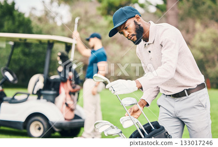 Golf, club and black man choose on course with golfing bag ready to start game, practice and training. Professional golfer, activity and male caddy with choice for exercise, fitness and recreation Golf, club and black man choose on course with golfing bag ready to start game, practice and training. Professional golfer, activity and male caddy with choice for exercise, fitness and recreation 133017246