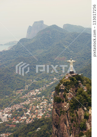 Brazil, statue and aerial of Christ the Redeemer on mountain for tourism, sightseeing and travel destination. Traveling, Rio de Janeiro and drone view of monument, sculpture and city mockup on hill Brazil, statue and aerial of Christ the Redeemer on mountain for tourism, sightseeing and travel destination. Traveling, Rio de Janeiro and drone view of monument, sculpture and city mockup on hill 133017256