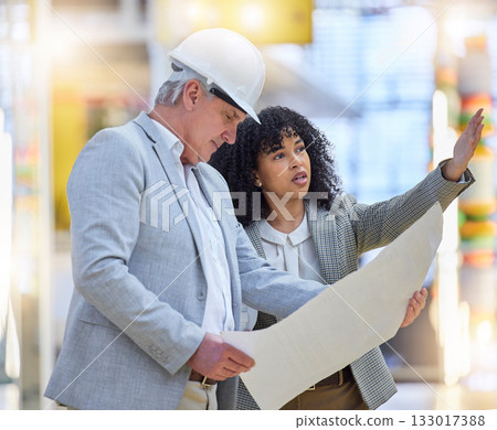 Man, woman and construction team pointing at building site, blueprint ideas and discussion of design. Diversity, project management and architecture for infrastructure, engineering and floor planning Man, woman and construction team pointing at building site, blueprint ideas and discussion of design. Diversity, project management and architecture for infrastructure, engineering and floor planning 133017388
