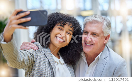 Selfie, smile and colleagues or business people taking a picture in an office feeling happy for a partnership. Online, about us and woman takes photo with man to update startup company social media Selfie, smile and colleagues or business people taking a picture in an office feeling happy for a partnership. Online, about us and woman takes photo with man to update startup company social media 133017401