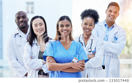 Portrait, doctors and arms crossed with smile for teamwork, healthcare and hospital management. Group of happy medical employees, diversity and clinic collaboration of integrity, trust and about us Portrait, doctors and arms crossed with smile for teamwork, healthcare and hospital management. Group of happy medical employees, diversity and clinic collaboration of integrity, trust and about us 133017448