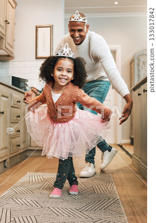 Child tutu, parent ballet dance and portrait of girl and father together bonding with dancing in the kitchen. Home, kid and dad with love and care in a house playing a dancer game for children fun Child tutu, parent ballet dance and portrait of girl and father together bonding with dancing in the kitchen. Home, kid and dad with love and care in a house playing a dancer game for children fun 133017842