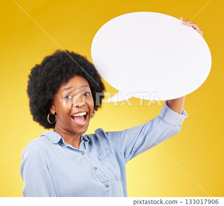 Speech bubble, portrait and happy black woman in studio with mockup for social media, advertising or space. Face, poster and girl with billboard on news, announcement or branding on yellow background Speech bubble, portrait and happy black woman in studio with mockup for social media, advertising or space. Face, poster and girl with billboard on news, announcement or branding on yellow background 133017906