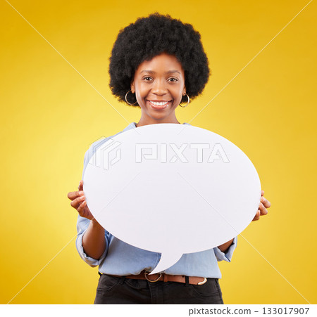 Portrait, speech bubble and happy black woman in studio with mockup for social media, advertising or space. Face, poster and girl with billboard on news, announcement or branding on yellow background Portrait, speech bubble and happy black woman in studio with mockup for social media, advertising or space. Face, poster and girl with billboard on news, announcement or branding on yellow background 133017907
