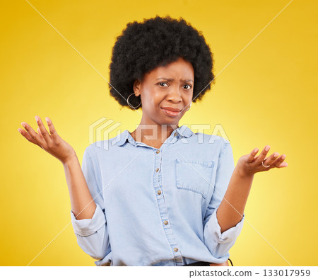 Confused, doubt and portrait of an African woman in studio, dont know and decision gesture on yellow background. Unsure, face and hands of a girl with why, emoji and or choice on mockup or isolated Confused, doubt and portrait of an African woman in studio, dont know and decision gesture on yellow background. Unsure, face and hands of a girl with why, emoji and or choice on mockup or isolated 133017959