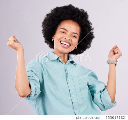 Happy, smile and portrait of black woman in studio for celebration, surprise and confidence. Winner, happiness and good news with female isolated on gray background for cheerful, yes and excited Happy, smile and portrait of black woman in studio for celebration, surprise and confidence. Winner, happiness and good news with female isolated on gray background for cheerful, yes and excited 133018182