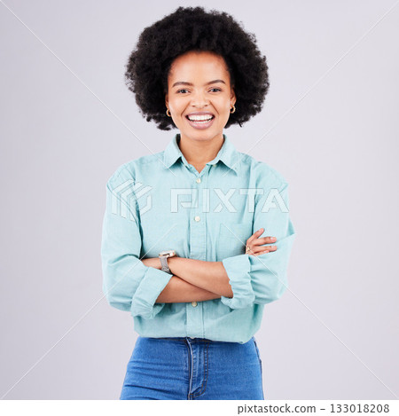 Smile, arms crossed and portrait of black woman in studio for confidence, positive and empowerment. Happiness, funny and elegant with female isolated on white background for young, excited and pride 133018208