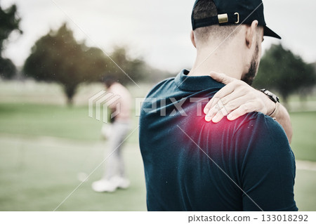Sports, injury and golf, man with shoulder pain during game on course, massage and relief in health and wellness. Green, hands on muscle for support and golfer with body ache during golfing workout. Sports, injury and golf, man with shoulder pain during game on course, massage and relief in health and wellness. Green, hands on muscle for support and golfer with body ache during golfing workout. 133018292