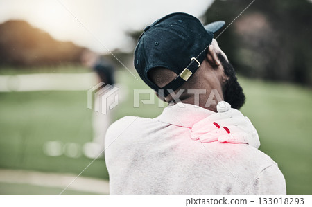 Sports, injury and golf course, black man with shoulder pain during game, massage and relief in health and wellness. Green, hands on muscle in support and golfer with body ache during golfing workout Sports, injury and golf course, black man with shoulder pain during game, massage and relief in health and wellness. Green, hands on muscle in support and golfer with body ache during golfing workout 133018293