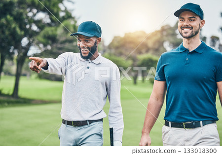 Friends, men on golf course and black man pointing, walking and talking on grass at game. Health, fitness and friendship, happy golfer man and friend with smile walk in nature on weekend together. Friends, men on golf course and black man pointing, walking and talking on grass at game. Health, fitness and friendship, happy golfer man and friend with smile walk in nature on weekend together. 133018300