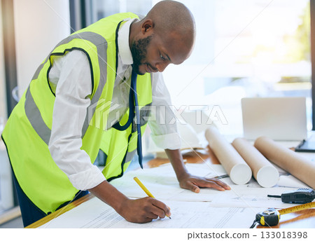 Architect, blueprint and man writing in office on paper, design and planning building project. Construction, engineer and male project manager with plan for property, model or renovation strategy Architect, blueprint and man writing in office on paper, design and planning building project. Construction, engineer and male project manager with plan for property, model or renovation strategy 133018398