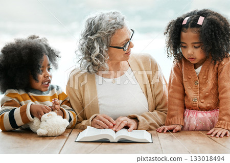 Bible, reading book or grandma with children for worship, support or hope in Christianity for education. Kids siblings, grandmother or old woman studying, praying or learning of God in religion Bible, reading book or grandma with children for worship, support or hope in Christianity for education. Kids siblings, grandmother or old woman studying, praying or learning of God in religion 133018494