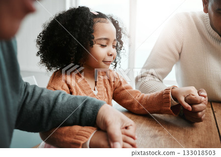 Worship, girl and family holding hands, praying and spiritual practice in home, peace and quality time. Female child, believers and group with support, holy and bonding with joy, guidance and praise Worship, girl and family holding hands, praying and spiritual practice in home, peace and quality time. Female child, believers and group with support, holy and bonding with joy, guidance and praise 133018503