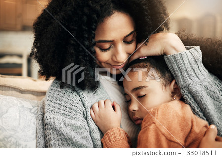 Family, love or child hug mother for Mothers Day, home bonding or embrace on living room couch. Care, custody and biracial mom, mama or woman with female youth kid, girl or daughter cuddle on sofa 133018511