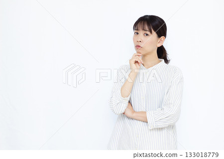 A woman who is seriously worried A woman who is seriously worried 133018779