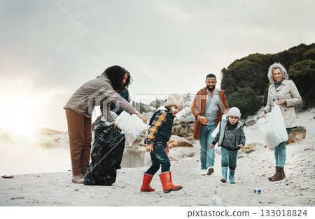 Beach cleaning, trash and children, family or volunteering group in education, learning and community support. Grandparents, people and kids helping with plastic waste or garbage for pollution action Beach cleaning, trash and children, family or volunteering group in education, learning and community support. Grandparents, people and kids helping with plastic waste or garbage for pollution action 133018824
