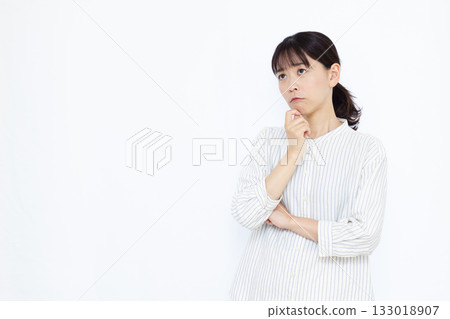 A woman who is seriously worried A woman who is seriously worried 133018907
