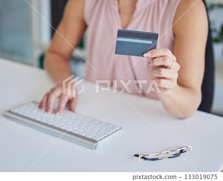 Computer, woman online shopping or hands with a credit card for payment on ecommerce website in business office. Zoom of financial trader trading or typing with digital money on internet via fintech Computer, woman online shopping or hands with a credit card for payment on ecommerce website in business office. Zoom of financial trader trading or typing with digital money on internet via fintech 133019075