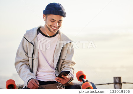 Skateboarder, phone and man streaming music, audio or podcast online and relax after skating with mockup and texting. Skater, skateboard and person listening to mobile radio in sunset on social media Skateboarder, phone and man streaming music, audio or podcast online and relax after skating with mockup and texting. Skater, skateboard and person listening to mobile radio in sunset on social media 133019106