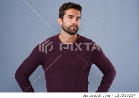Attitude, thinking and portrait of man in studio with confidence, uncertain and thoughtful on blue background. Confused, mockup space and male person skeptical for decision, choice and question 133019284