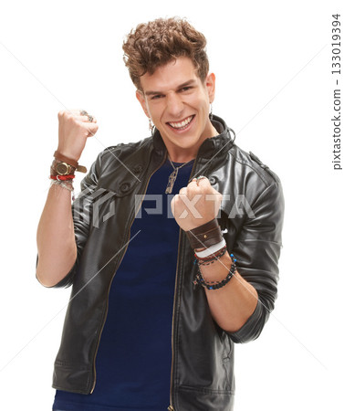 Young man, portrait and fist celebration in portrait for fashion, punk aesthetic and happy by white background. Isolated guy, model and excited with retro leather clothes, goal or winning by backdrop Young man, portrait and fist celebration in portrait for fashion, punk aesthetic and happy by white background. Isolated guy, model and excited with retro leather clothes, goal or winning by backdrop 133019394