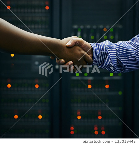 Handshake, partnership or people in server room of data center worker for network help with IT support. B2b deal agreement, teamwork closeup or successful men shaking hands together in collaboration 133019442